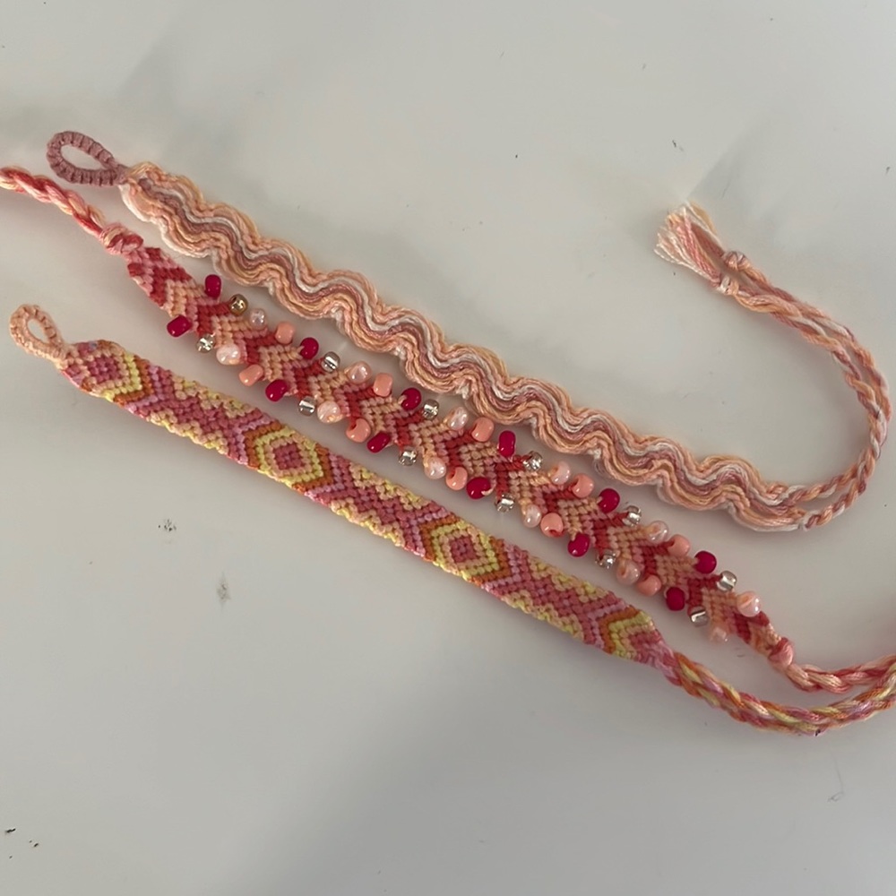 Set of three super cute pink friendship bracelets